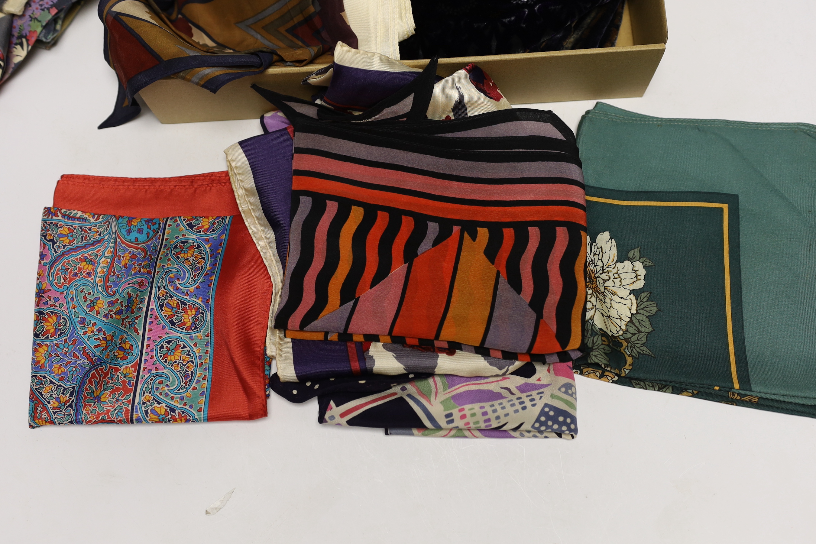 A collection of thirteen Liberty printed scarves